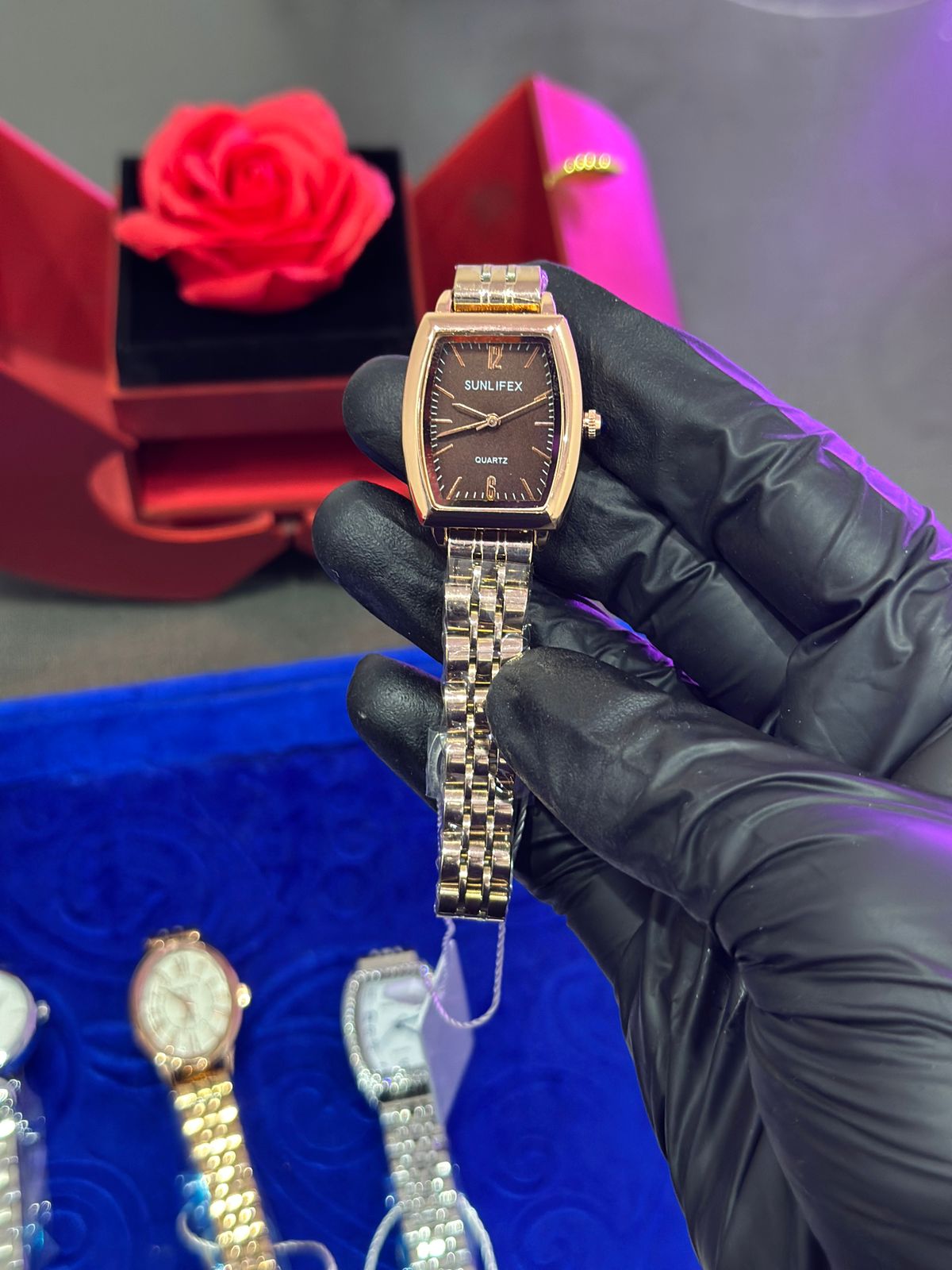 SN rose gold black dial